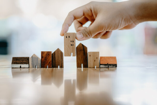 wooden houses to represent landlord insurance